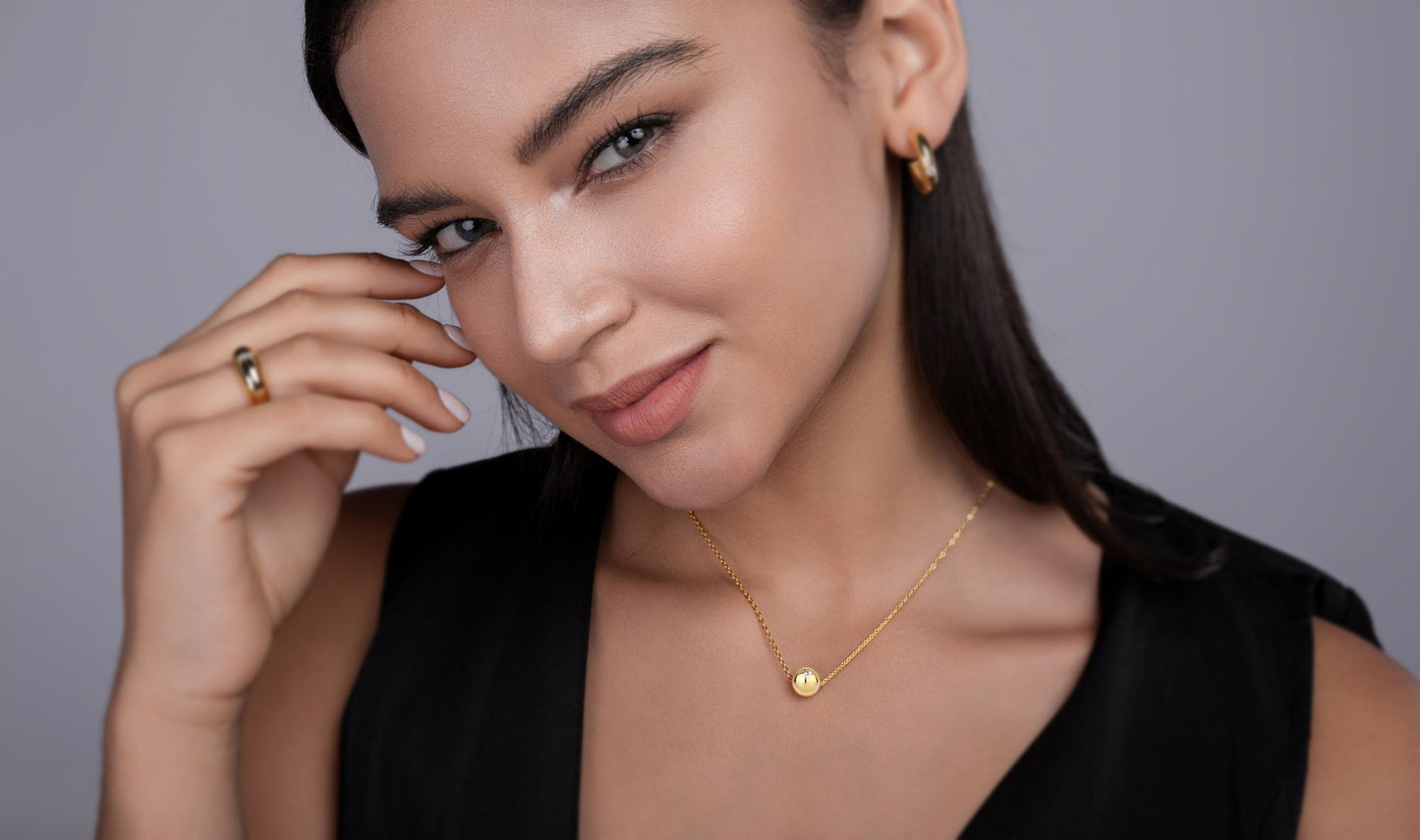 Good Fortune Flows - A fashionable and trendy jewelry necklace pendant set with 0.1-carat Moissan diamond S925 sterling silver and gold-plated